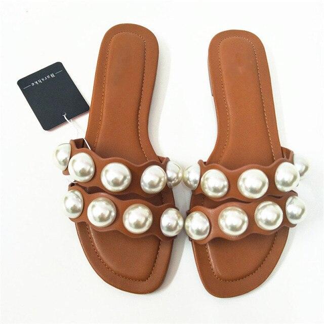 Stevvex pearl flat sandals for women, casual beach flip flops with slip-on design and decorative pearls, ideal for summer and bridal wear.