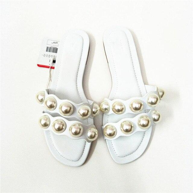 Stevvex pearl flat sandals for women, casual slip-on beach flip flops with pearl embellishments, perfect for summer and bridal occasions.