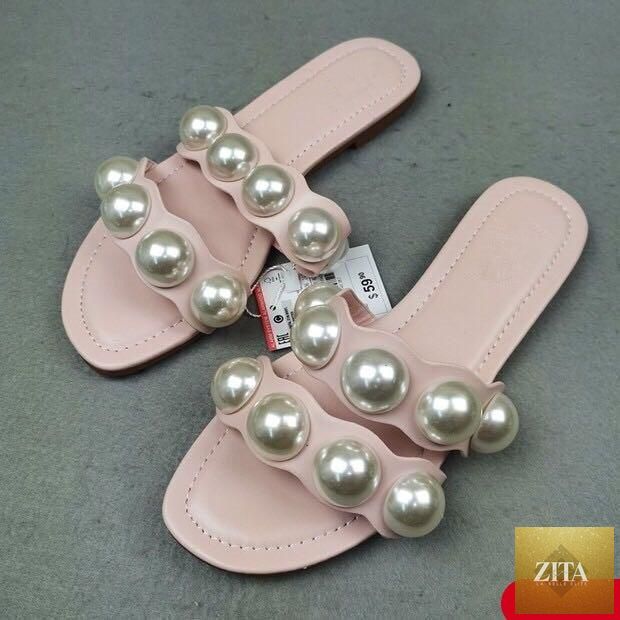 Stevvex pearl flat sandals for women, slip-on beach flip flops with decorative pearls, perfect for casual or bridal summer wear.
