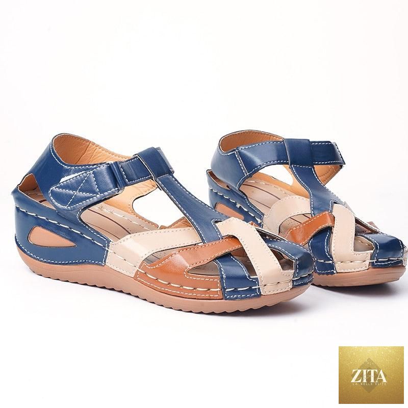 Stevvex women's waterproof slip-on summer flat sandals with round toes, arch support, and leather design for outdoor casual wear.