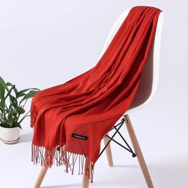 Stevvex winter long women’s scarf with soft, warm fabric, styled as a fashionable shawl or wrap for cold weather.