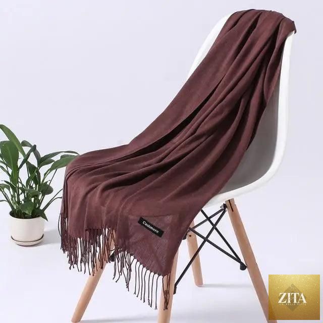 Stevvex winter long women's scarf with soft, warm fabric, styled as a wrap or shawl for cold weather.