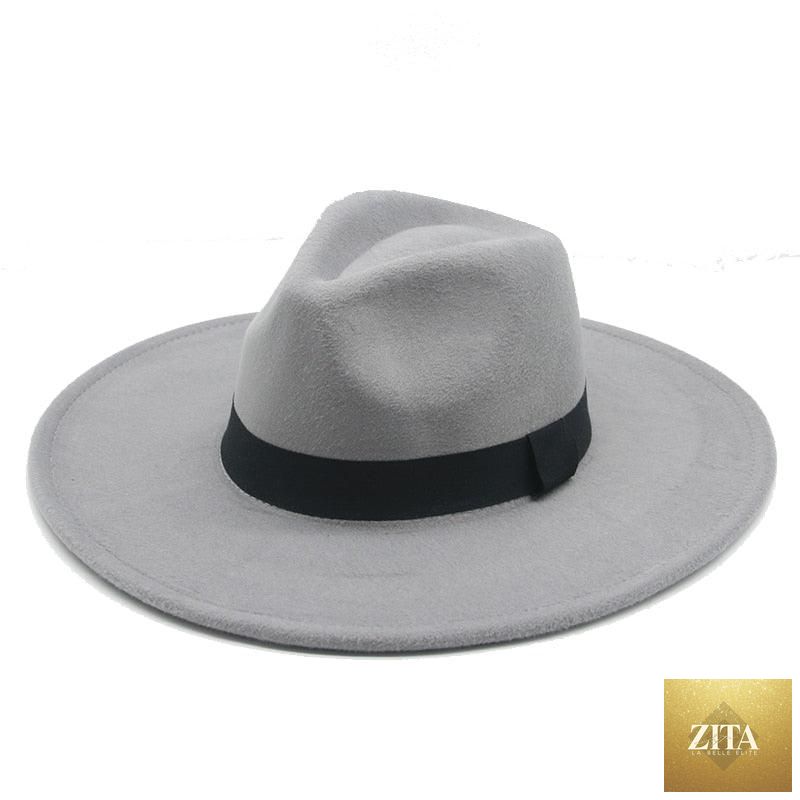 Elegant women's wide-brim fedora hat by Stevvex with retro style, warm fabric, and adjustable belt, suitable for weddings and fashion.