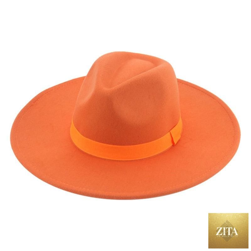 Elegant women's fedora hat with wide brim, retro style, warm fabric, and decorative belt, suitable for weddings and casual wear.