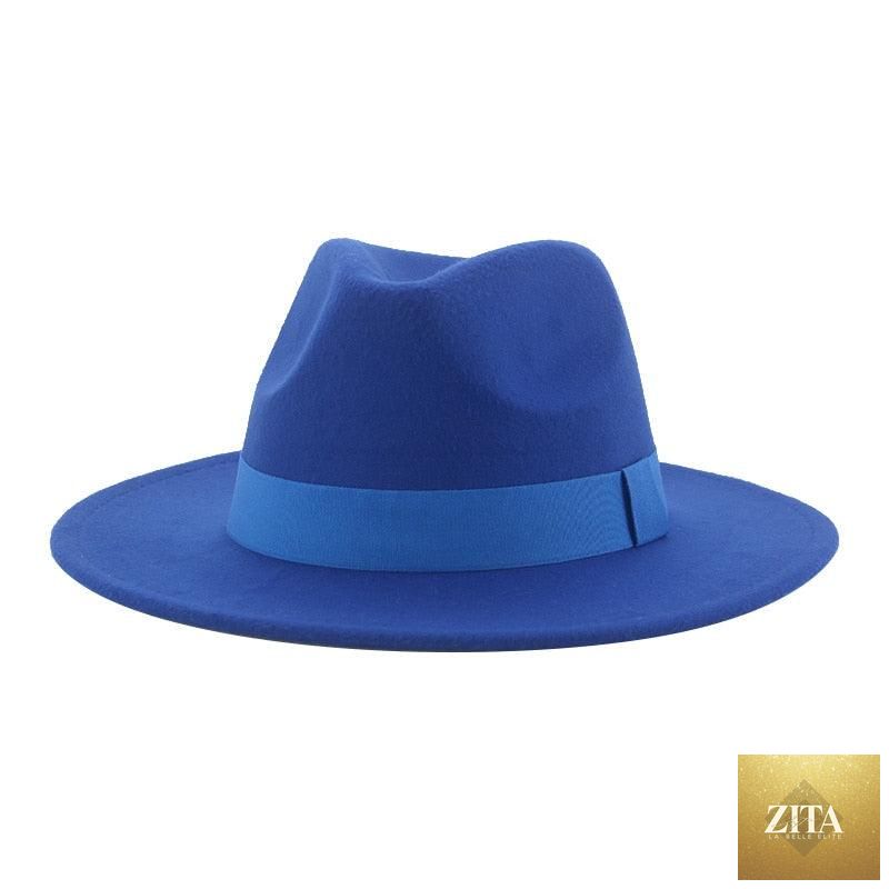 Elegant women's wide-brim Fedora hat by Stevvex, featuring a retro style, warm fabric, and adjustable belt for stylish wear.