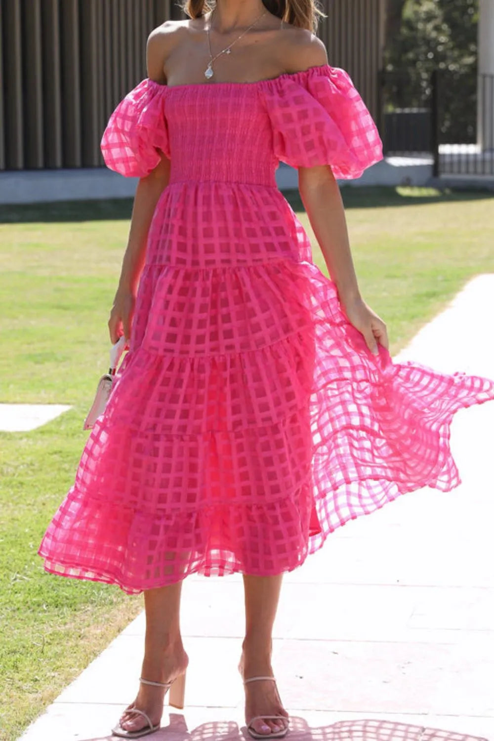 Off shoulder short puff sleeve midi dress by Shopiebay, featuring a flowing silhouette and elegant design perfect for summer events.