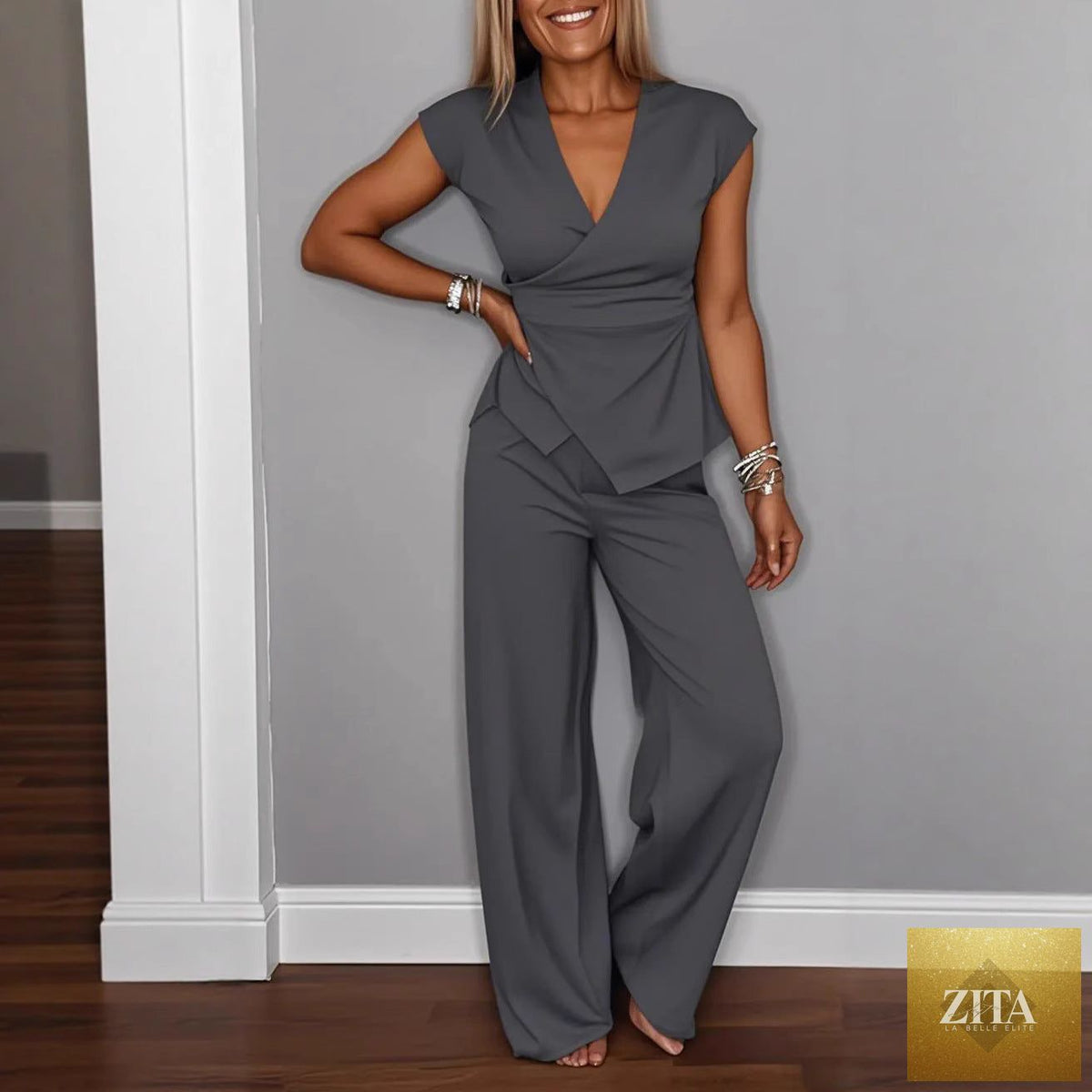 Zita La Belle Elite women's casual pleated vest and pants set with metal buckle details, featuring a stylish and comfortable design.