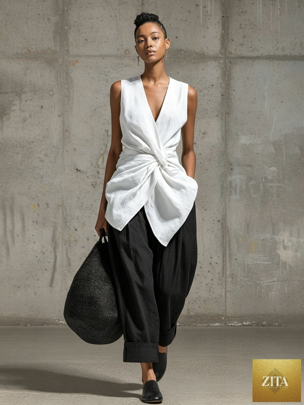 Women's casual FitiqueFit tie-front V-neck sleeveless top and wide-leg pants set, shown in a stylish, relaxed fit ensemble.