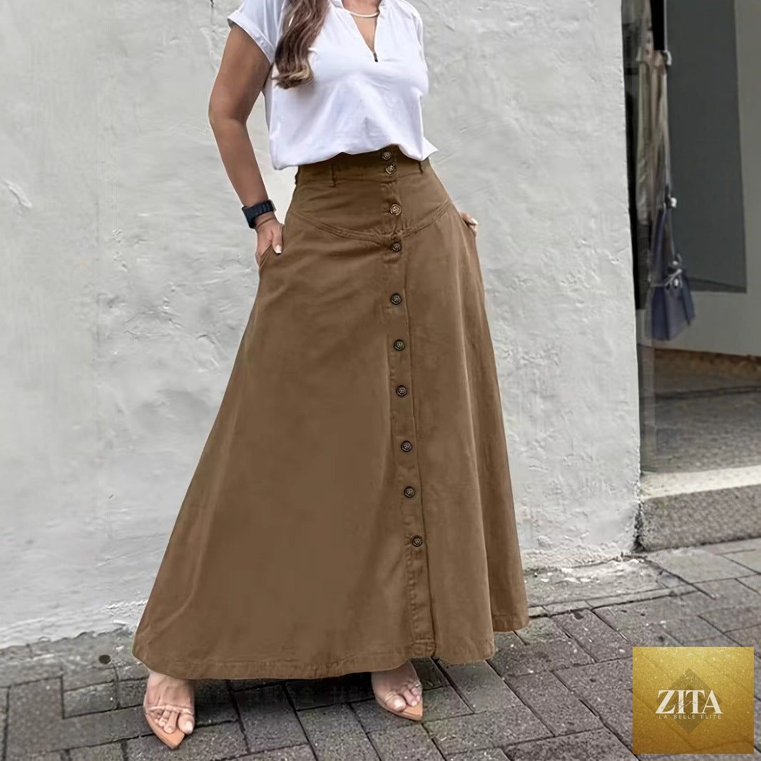 Women's elegant high-waist A-line skirt by FitiqueFit, shown in a stylish, flowing design in a neutral color.