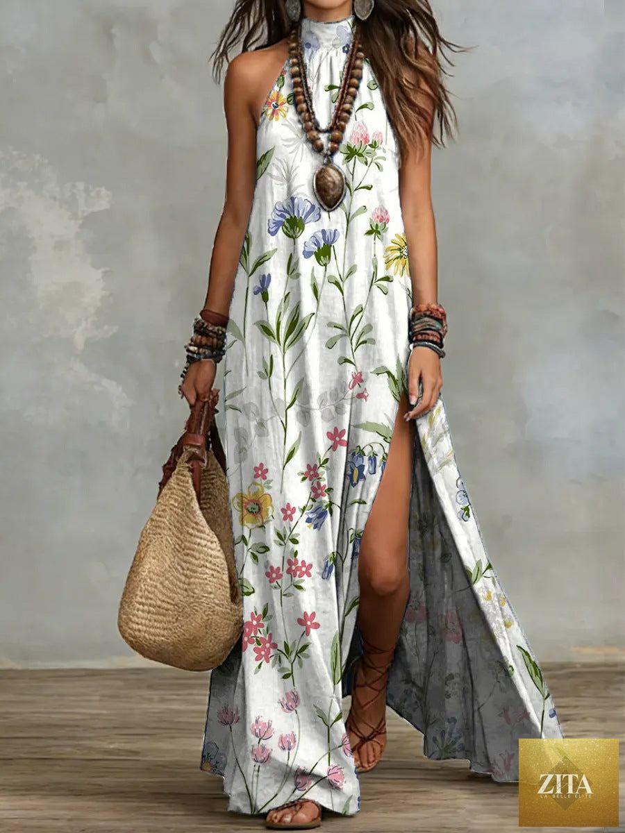 Women's sleeveless floral print maxi dress by Zita La Belle Elite, featuring a split design and vibrant floral pattern.