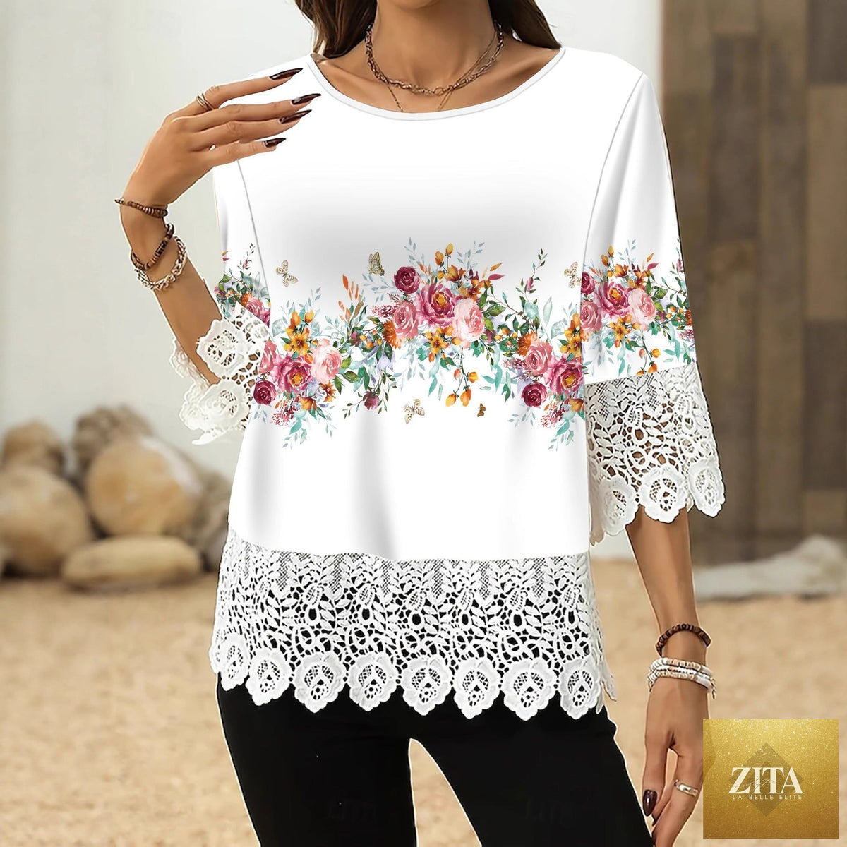 Printed patchwork women's three-quarter sleeve top by Zita La Belle Elite, loose fit casual pullover with colorful patchwork design.