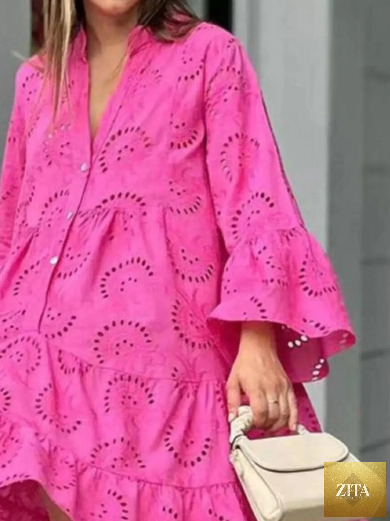 Eyelet ruffled hem tiered dress from Shopiebay featuring a feminine design with layered fabric and eyelet detailing.