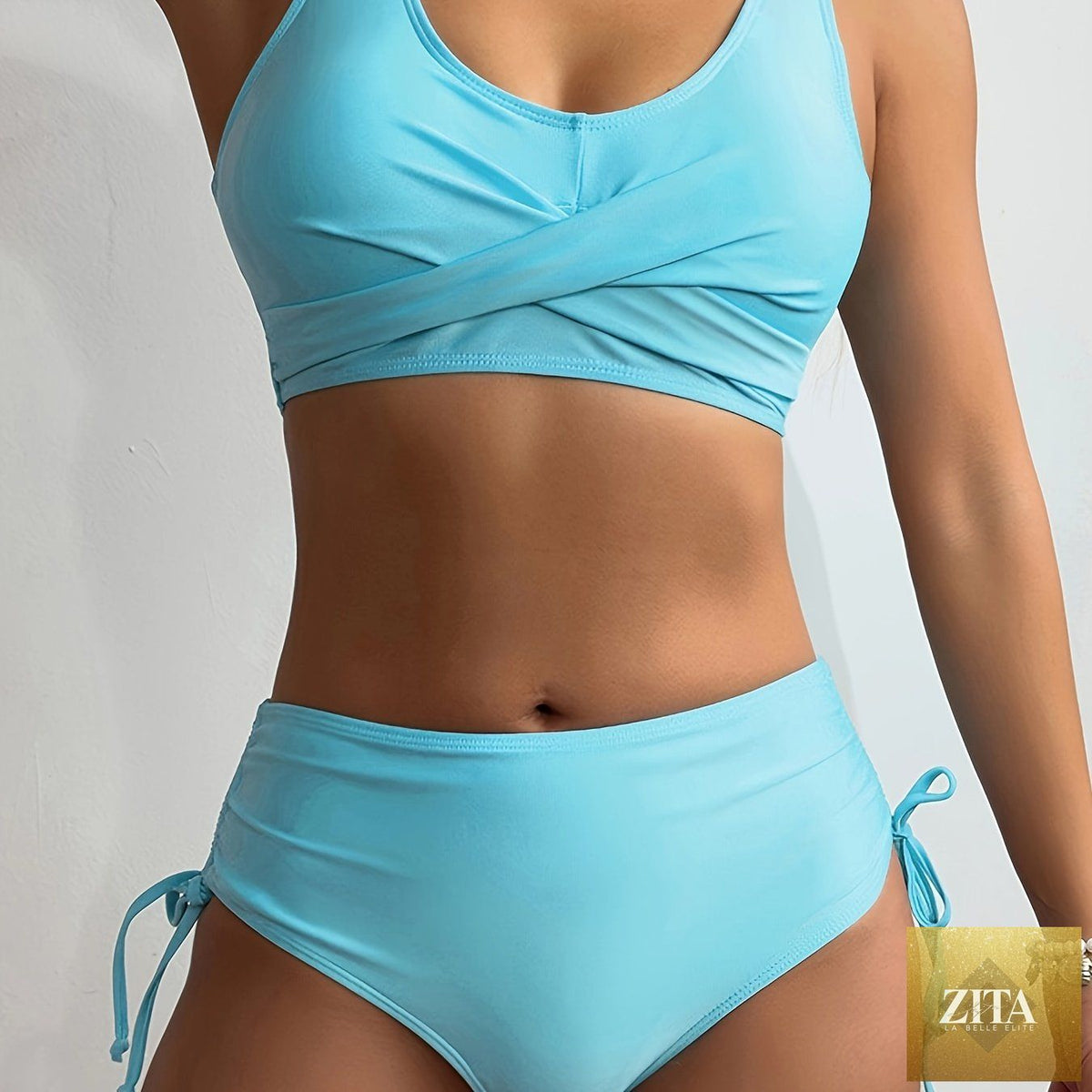 Stevvex bikini set featuring a twist front V-neck top and high waist bottom, with tie back and drawstring for a comfortable fit.
