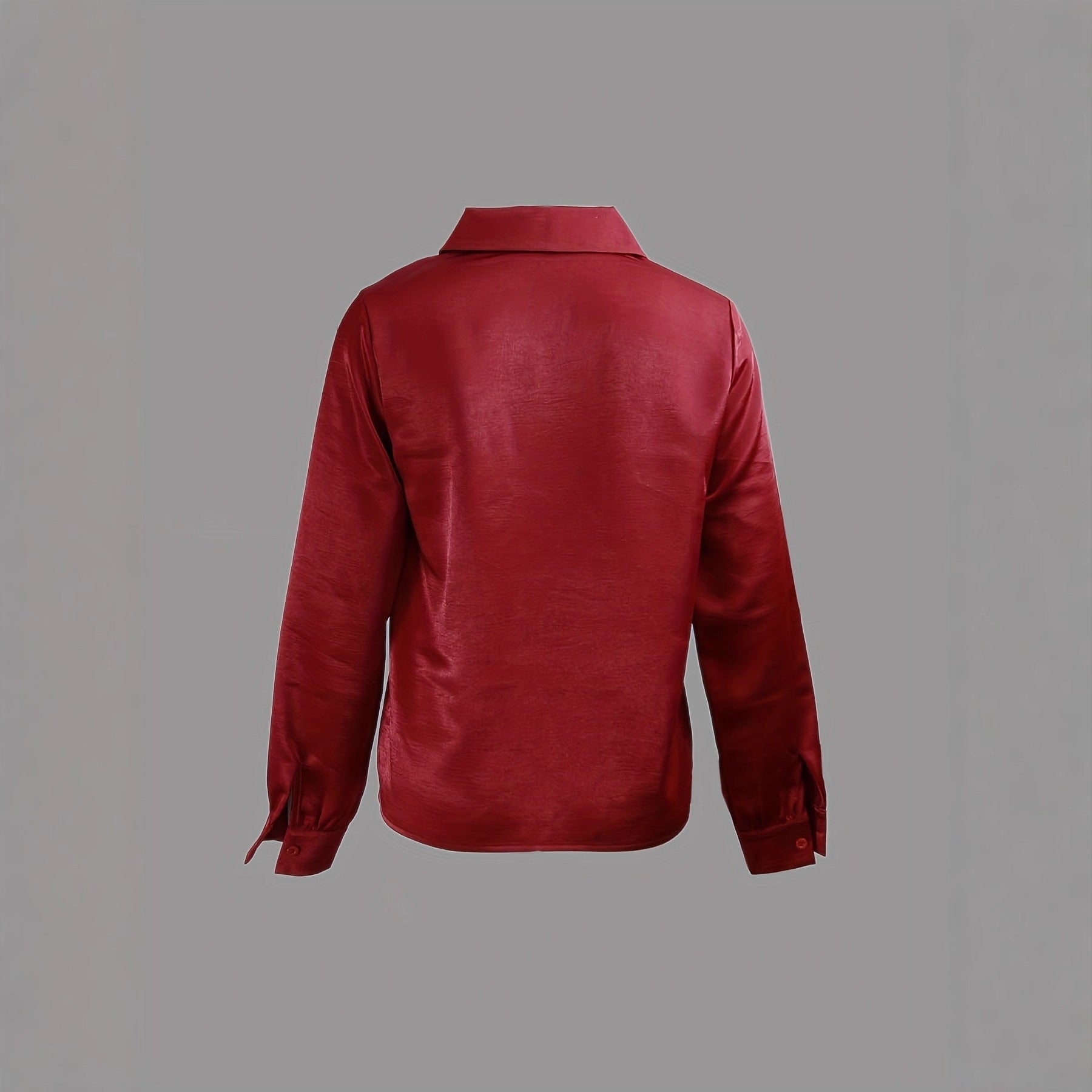 Elegant solid-color minimalist V-neck long-sleeve shirt, displayed on a hanger, showcasing a sleek, simple design in neutral fabric.