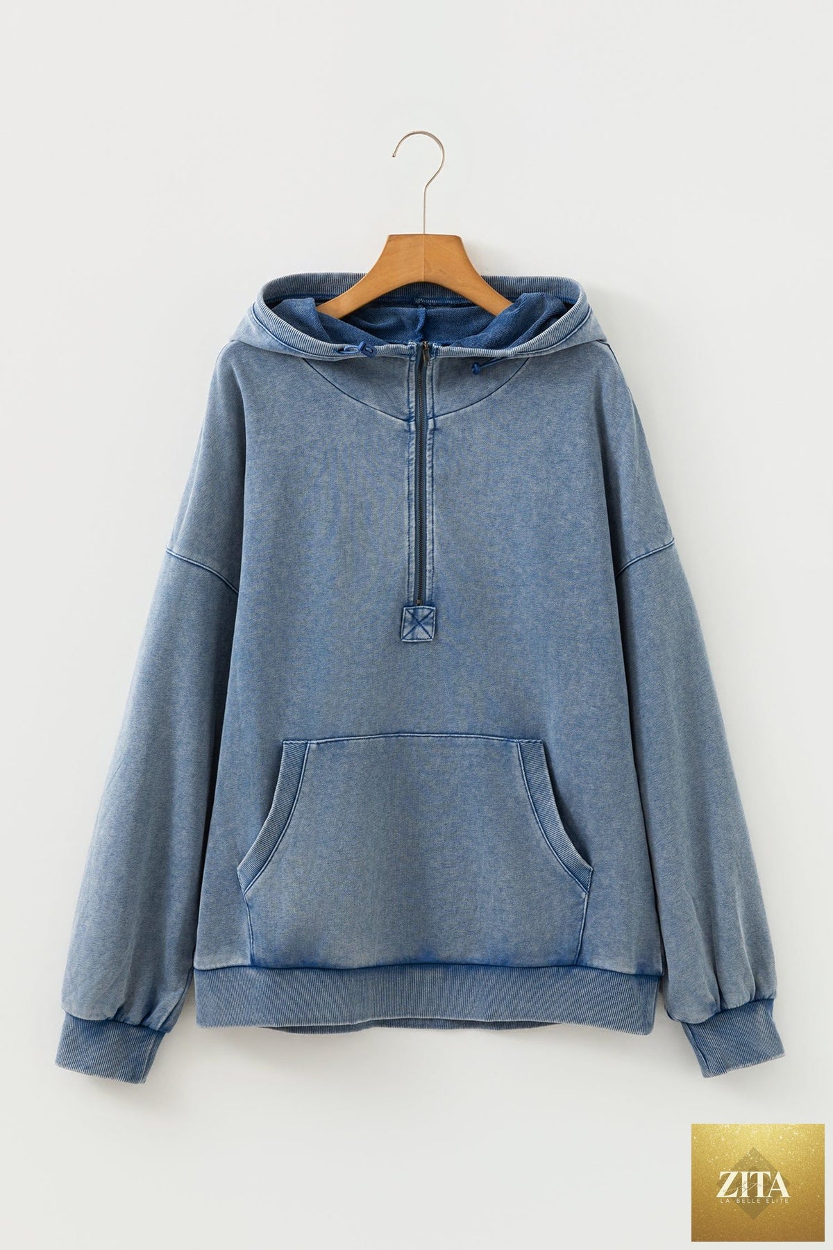 Black half zip hoodie with kangaroo pocket and mineral wash finish, relaxed fit sweatshirt from Wild and Free Boutique.