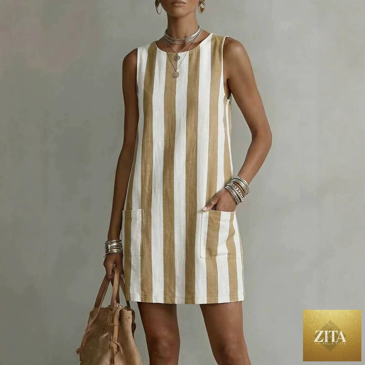 Women's striped color-block sleeveless mini dress by FitiqueFit, featuring a loose fit casualwear style with bold, vibrant stripes.