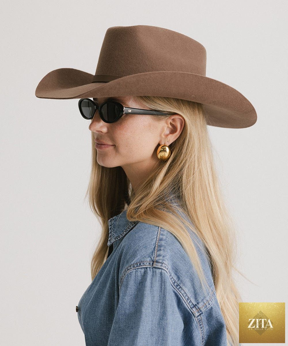 GIGI PIP Shane cowboy hat made of felt, featuring a wide brim and classic western style, shown from a side view.