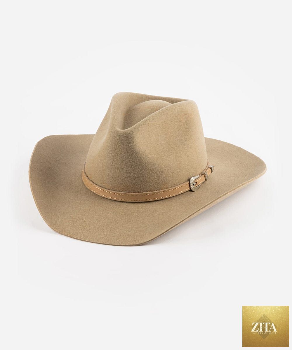 Tan felt cowboy hat with pinched crown by GIGI PIP, designed in a Western style, shown in size XS with a 55cm brim.