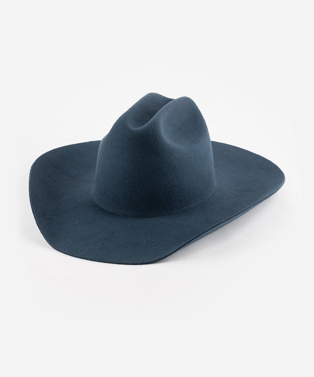 Vintage blue GIGI PIP Teddy Cattleman cowboy hat made of felt, featuring a classic western style with a curved brim and band detail.