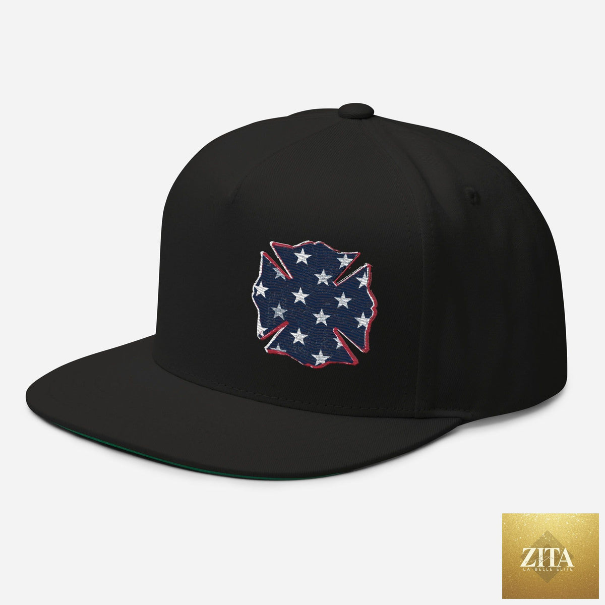 Black Freedom Maltese flat bill hat by Zita La Belle Elite, shown from the front-left angle.