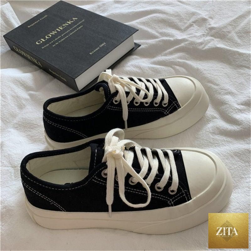 White women's Stevvex canvas sneakers with low-top design, platform sole, round toe, athletic and casual style, mesh and vintage look.