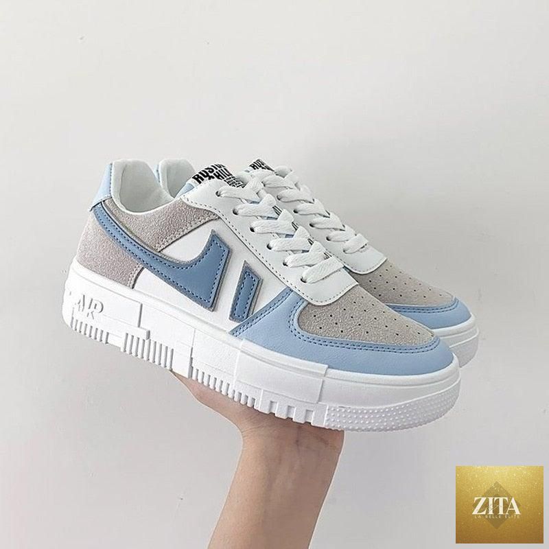Stevvex women's white casual flats sneakers with breathable mesh, lace-up design, and low-top style for comfortable walking.