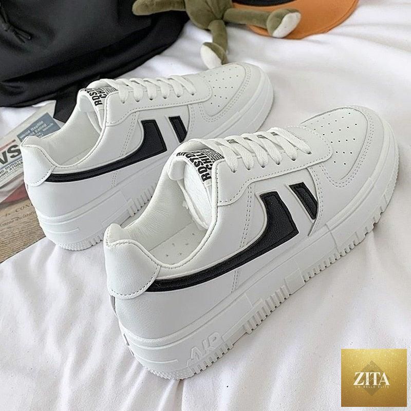 Stevvex women's white casual breathable flats with lace-up design, low-top sneakers ideal for walking and everyday comfort.