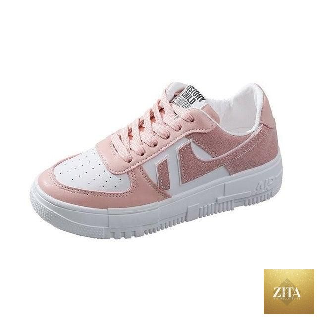 White Stevvex women's casual breathable lace-up flats with low-top design, ideal for walking and casual sports.