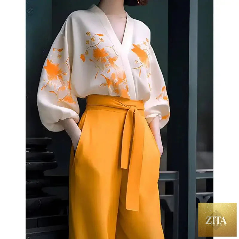 Royalessencelux floral silk slimming wear set with flab-hiding shirt and wide-leg pants, designed for plus size comfort and style.
