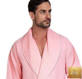 Front view of Lotus Linen men's premium waffle piping robe in blush with piping details, lightweight and comfortable for lounging.