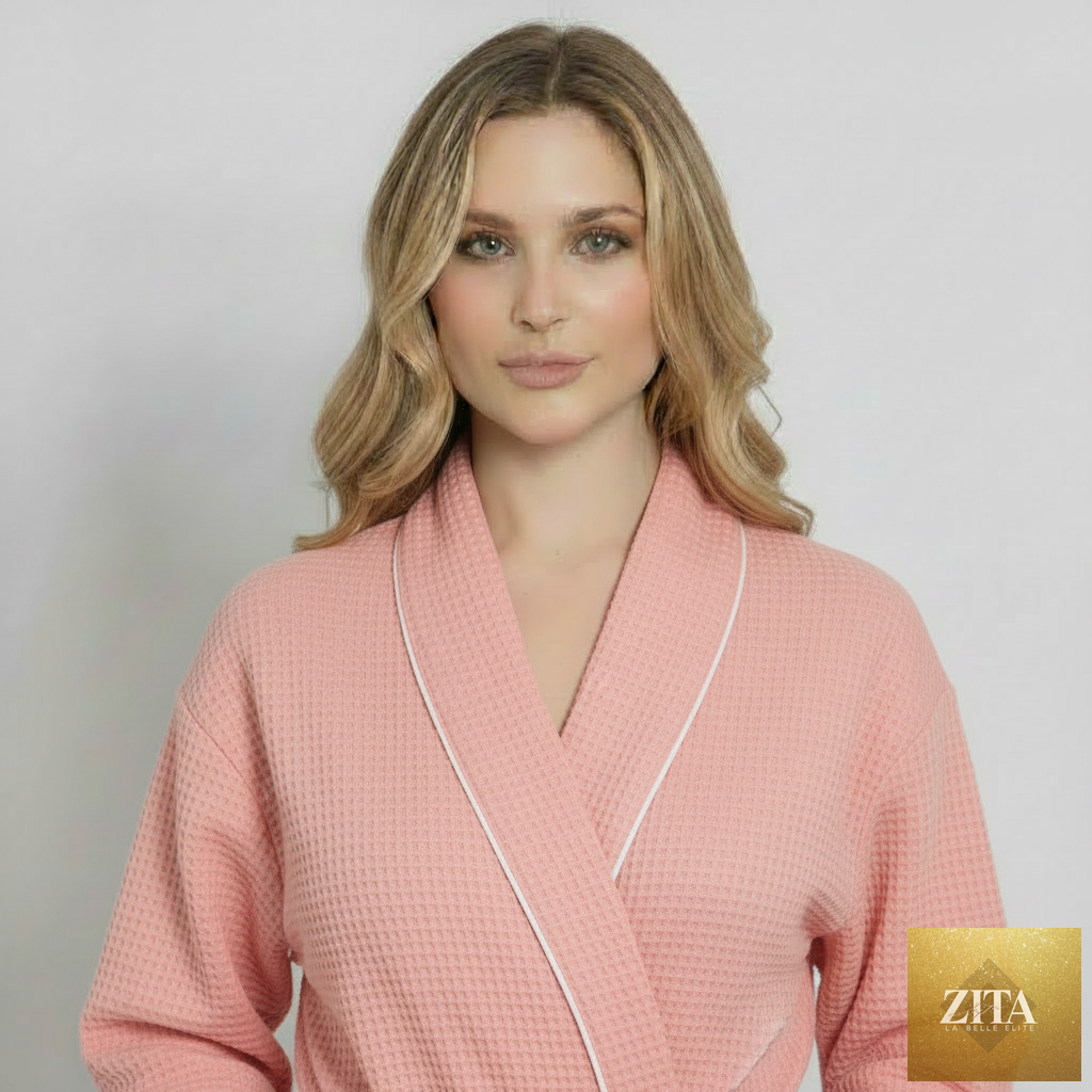 Front view of Lotus Linen knee-length blush waffle robe for women, showcasing soft fabric and relaxed fit.