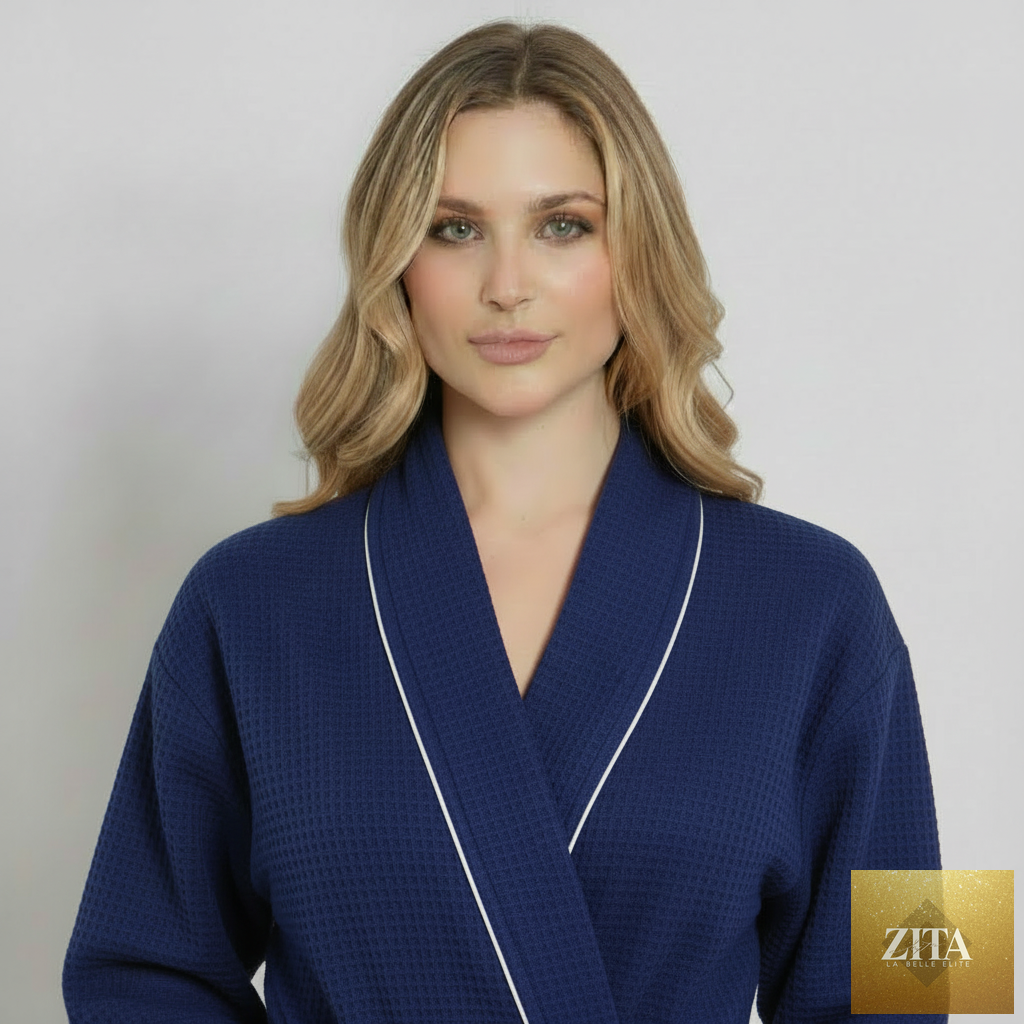 Navy knee-length waffle robe for women by Lotus Linen with piping, shown from the front with small size and cozy fabric.