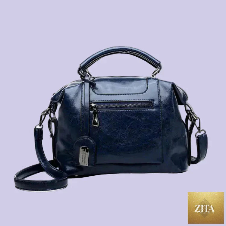 Leather women’s handbag with soft tote and crossbody design, stylish purse from Trendy Attic Store01, shown in black with sleek finish.