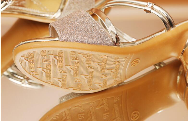 Gold open-toe women’s summer sandals by Stevvex with ankle strap, low heel, stylish dress and party shoes for women.