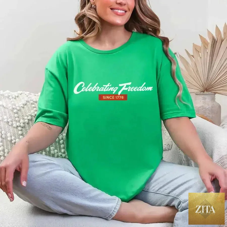 Green 4th of July patriotic T-shirt by Adorb Custom Tees featuring "Celebrating Freedom Since 1776" design.