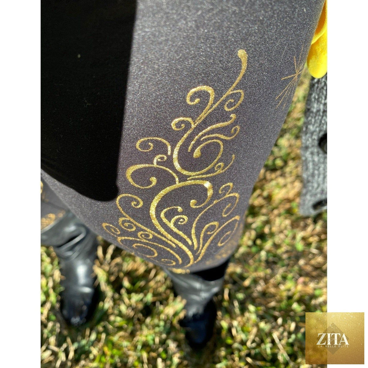 Black and gold Christmas tree leggings by MM with pockets, featuring festive holiday design and comfortable stretchy fabric.