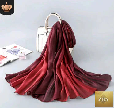 Light gradient silk scarf for women offering sun protection, stylish accessory from Trendy Attic Store01, shown draped and folded.