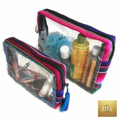 Lumily Hacienda transparent toiletry travel bag with multiple compartments, ideal for organizing personal items on the go.