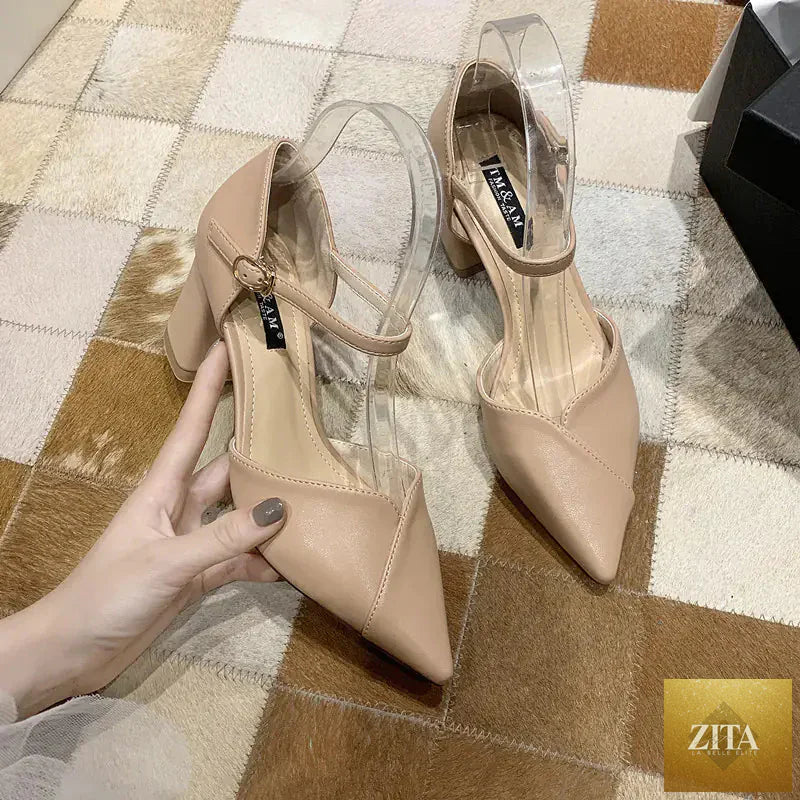 Elegant women's pointed toe high heels with thick heels in a sexy one-word design, perfect for stylish occasions.