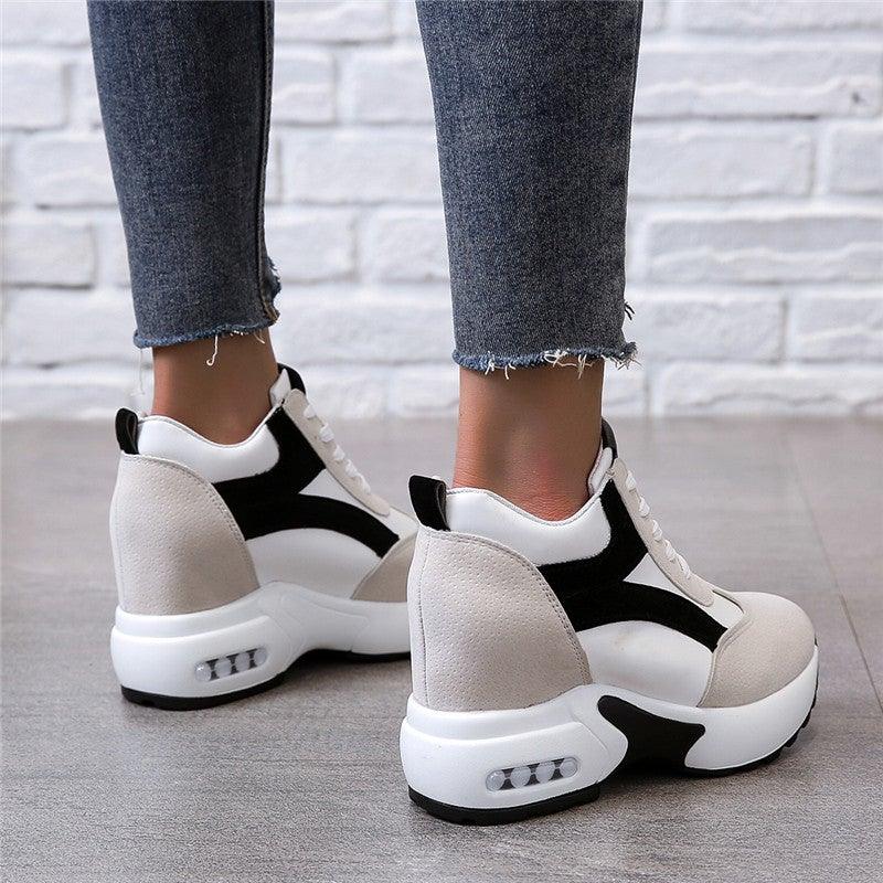 Red and black Stevvex women's sneakers with air cushion, lace-up platform, leather upper, suitable for casual, athletic, and walking activities.