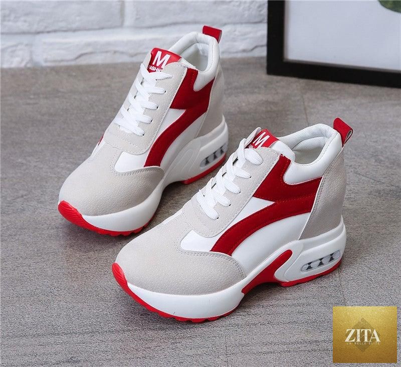 Red and black women's sneakers with air cushion, lace-up platform design, leather trainers, suitable for casual, athletic, and walking activities.