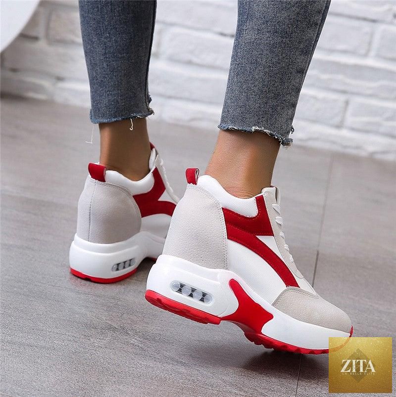Red and black women's sneakers with air cushion, lace-up platform, leather design, suitable for casual, athletic, and walking activities.