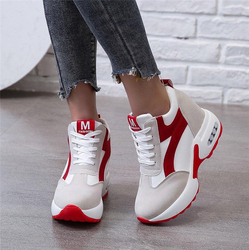 Red and black Stevvex high heel sneakers with air cushion, lace-up design, leather material, modern athletic casual shoes for women.