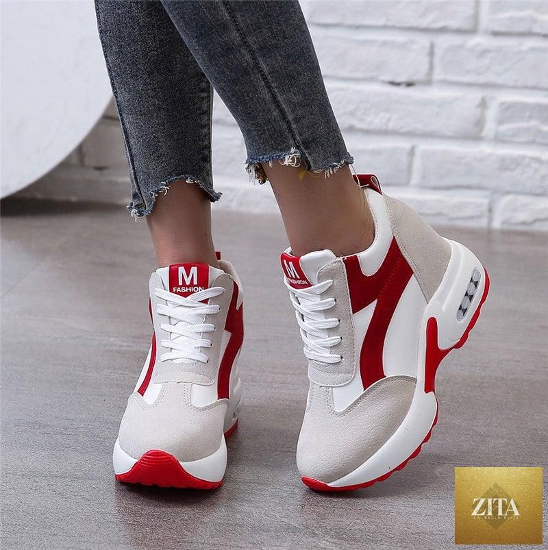 Red and black high-heel women's sneakers with air cushion, lace-up platform design, leather trainers for casual and athletic wear.