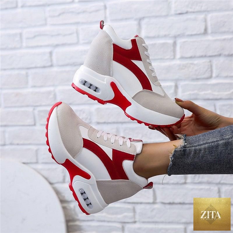 Red and black women's sneakers with air cushion, lace-up platform design, leather material, suitable for casual, athletic, and walking activities.