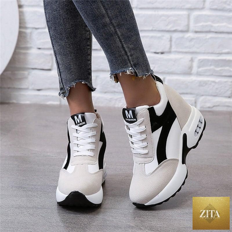 Red and black women's sneakers with air cushion soles, lace-up platform design, leather trainers, ideal for casual and athletic wear.