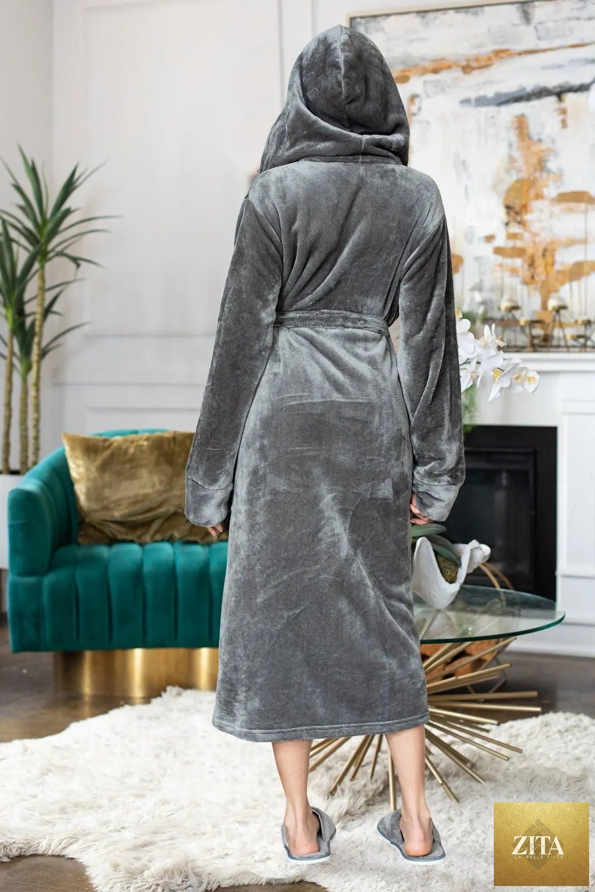 Soft women's plush hooded robe by Lotus Linen, cozy and comfortable, perfect for relaxing at home.