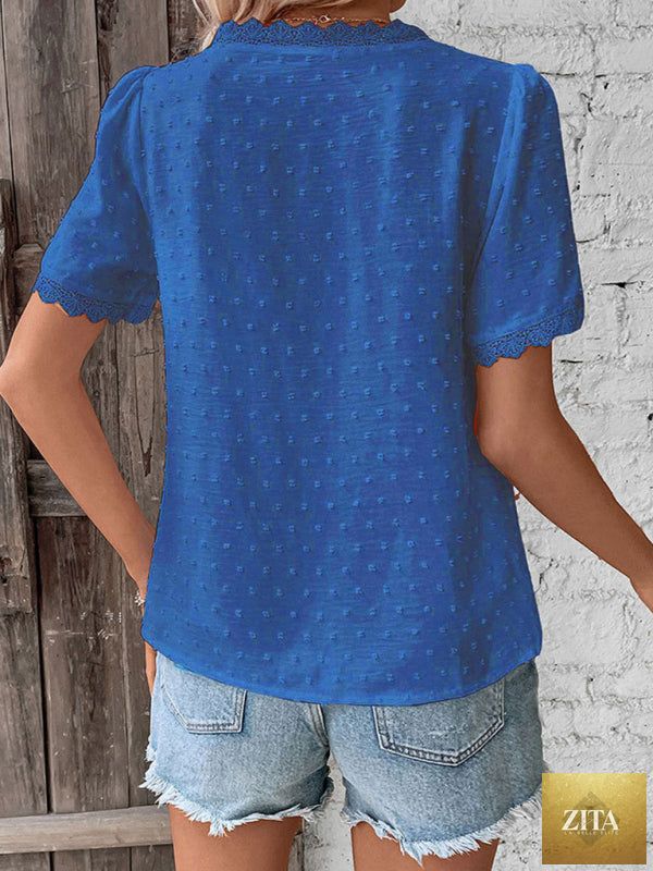 Lady Ros V-neck lace panel blouse featuring short sleeves, elegant women’s top with delicate lace details.