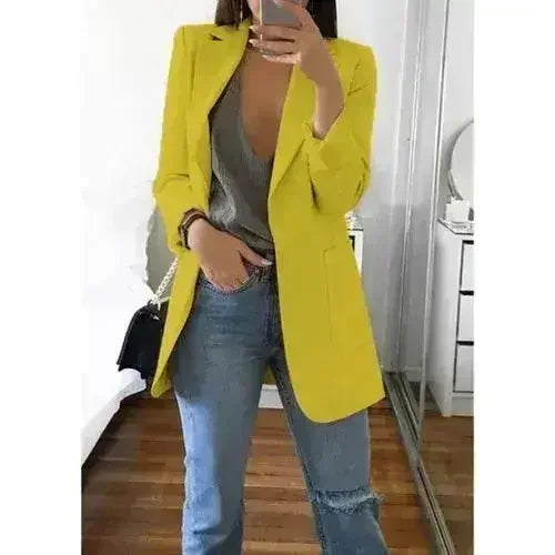 Femstylo women's casual slim blazer jacket with lapel, suitable for office and fashion, featured in a home and garden setting.