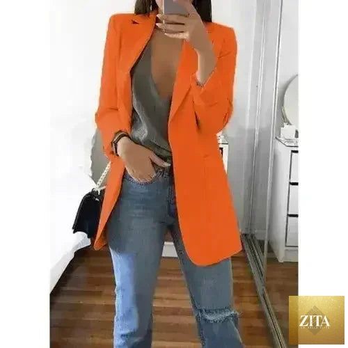 Femstylo women's slim blazer jacket with lapel, suitable for office wear and casual autumn fashion, shown in a home and garden setting.